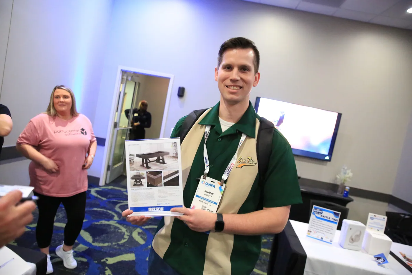 Small group of industry leaders in conversation at the after-hours event